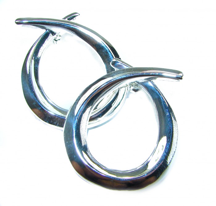 Large 1 5/8 inches long highly polished .925 Sterling Silver Italy made Earrings - Close-up of large polished .925 Sterling Silver earrings, side view.