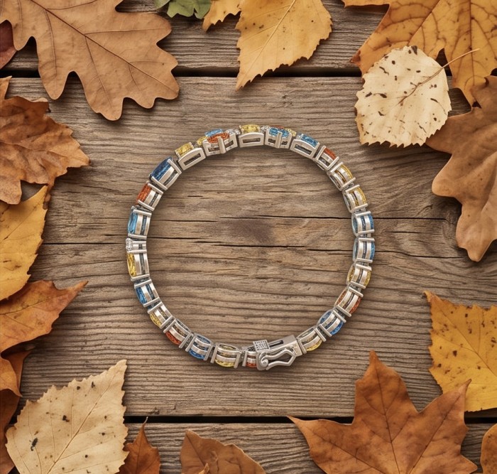 Gabriella 22.2 carat authentic multicolor Sapphire rhodium over .925 Sterling Silver handcrafted Statement Bracelet - Gabriella multicolor Sapphire bracelet on wood with autumn leaves overhead view.