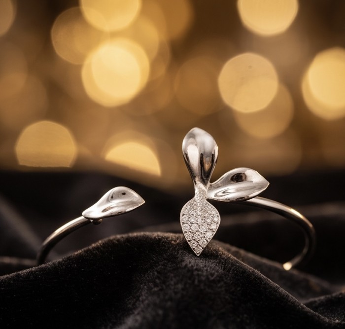 Authentic 0.5 CARAT natural pave White Topaz .925 Sterling Silver handcrafted Statement bracelet - Sterling silver bracelet with leaf design and topaz, close-up view.