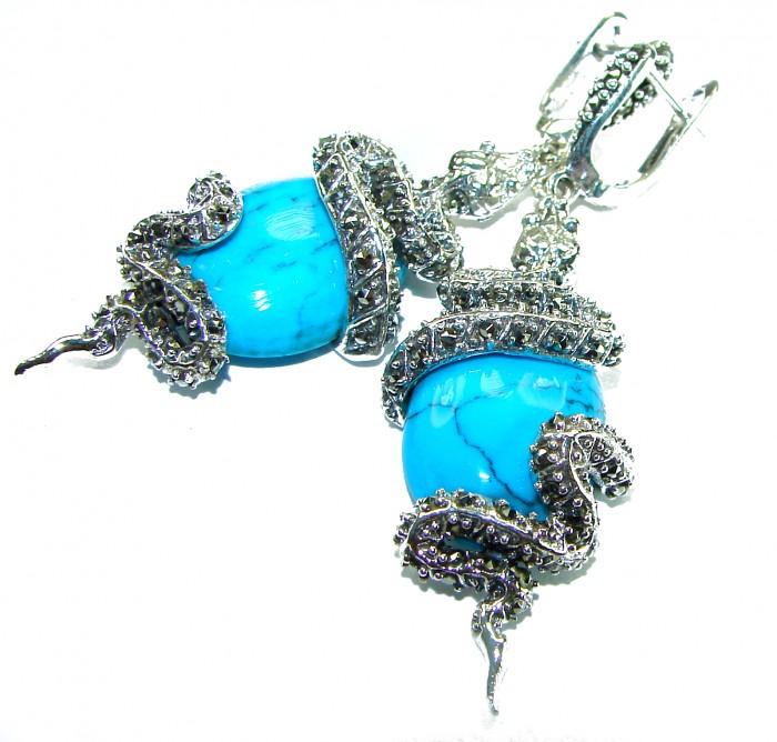 Great authentic inlay Turquoise .925 Sterling Silver handcrafted Earrings - Turquoise and silver snake earrings, front view, showing stones and details.