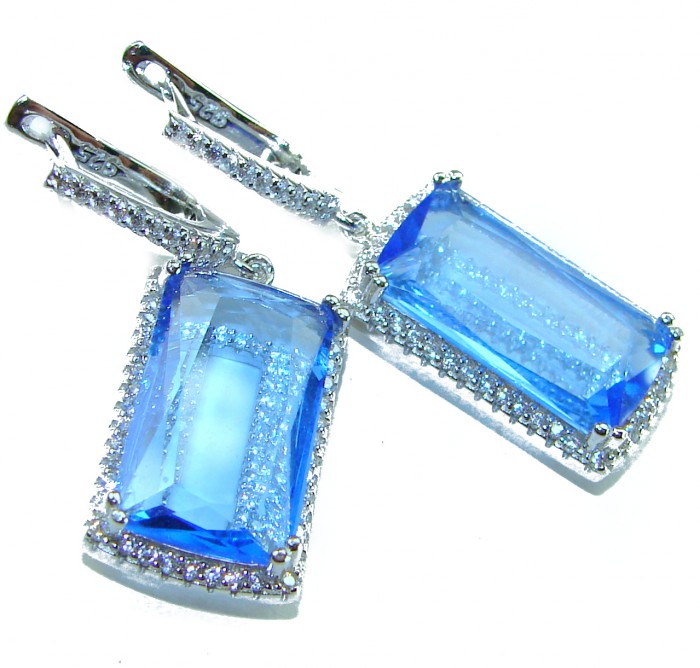 Eau Pure 14.5 carat Swiss Blue Topaz .925 Sterling Silver Handcrafted Earrings - Close-up of Swiss Blue Topaz earrings with silver setting.