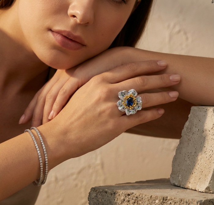 FLOWER - 4.8 carat Authentic SAPPHIRE 2 TONES .925 Sterling Silver Handcrafted Ring size 6 1/4 - Close-up of floral sapphire ring worn on hand with bracelets.