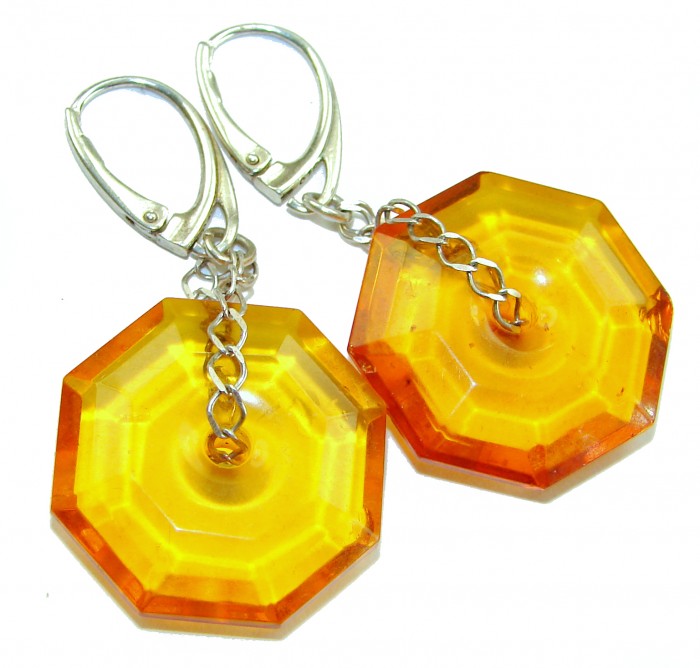 Very Special product - Wonderful natural faceted Baltic Amber .925 Sterling Silver entirely handcrafted earrings - Faceted amber earrings with silver hooks, top view.