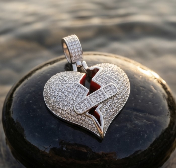 Healing Heart Luxurious 8.4 carat White Topaz .925 Sterling Silver handcrafted pendant - Pendant close-up on black stone background, Healing Heart design.