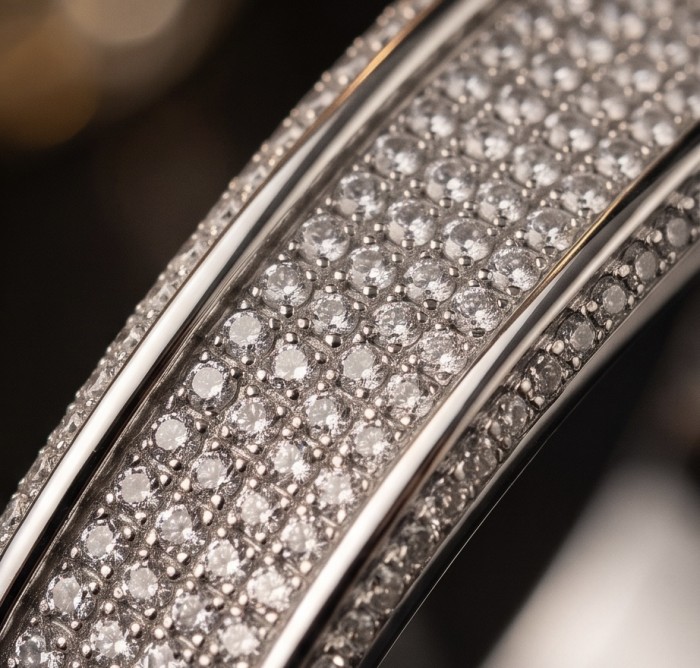 Priscilla 1.9 carat pave White Topaz rhodium over .925 Sterling Silver Bangle highly polished bracelet - Close-up of Priscilla pave White Topaz ring in rhodium over silver.