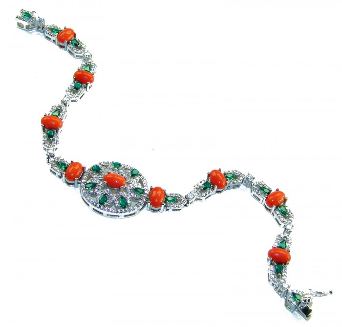 Serenity - 72.5 carat genuine Coral Emerald .925 Sterling Silver handmade Statement Bracelet - Bracelet angled view, coral and emerald stones, silver setting.