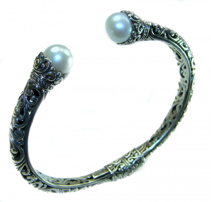 Bali Legacy authentic WHITE PEARL Floral Bracelet in .925 Sterling Silver - Intricate Bali white pearl bracelet, side view with floral detail.