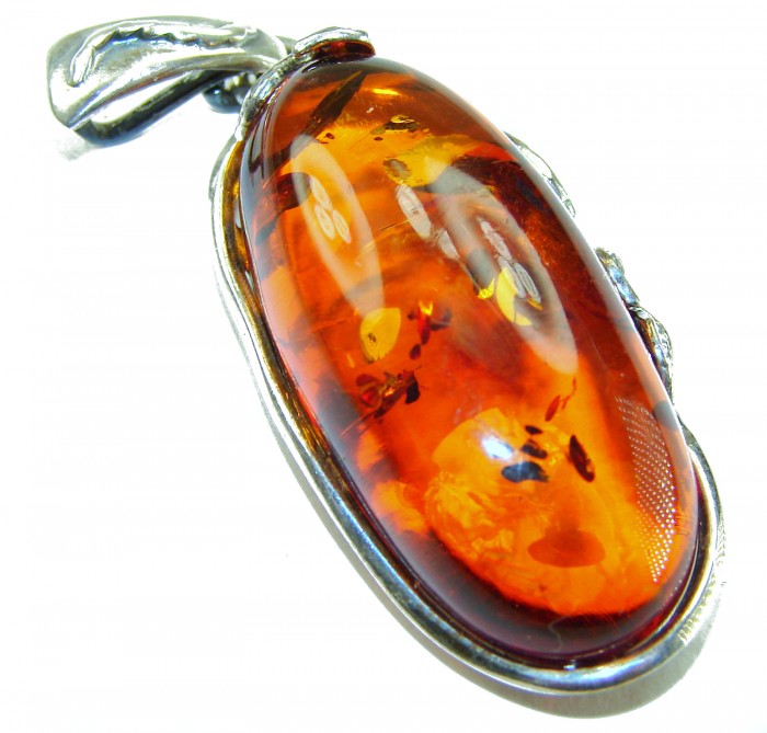 Prehistoric Authentic Baltic Amber .925 Sterling Silver beautifully handcrafted Pendant - Close-up of Baltic amber pendant in sterling silver setting