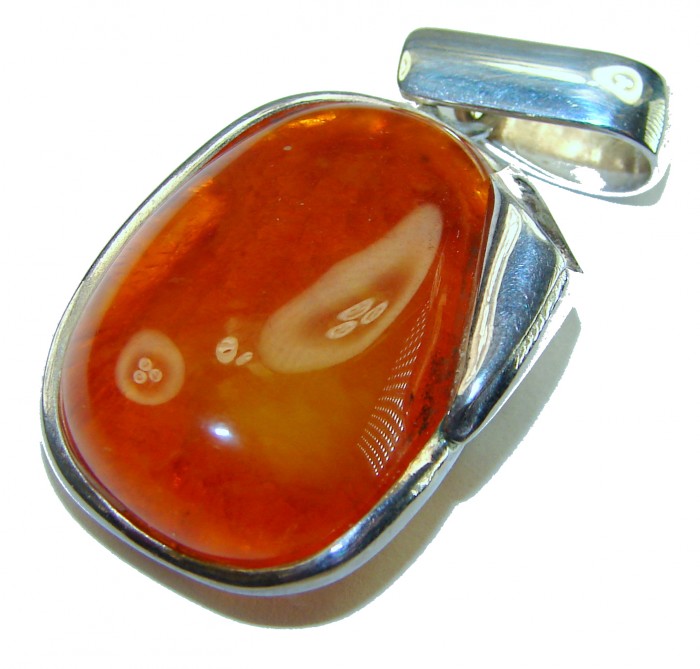 Prehistoric Authentic Baltic Amber .925 Sterling Silver beautifully handcrafted Pendant - Stone close-up of Baltic amber in .925 sterling silver setting