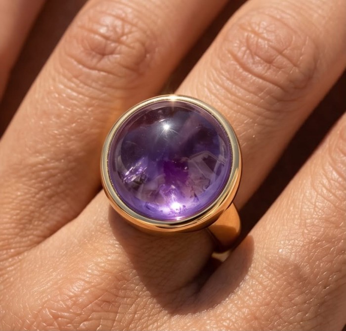 Purple Royalty 20.5 carat Amethyst .925 Sterling Silver dipped in 18K Gold Handcrafted Ring size 8 adjustable - Amethyst stone close-up, worn on hand, gold setting.