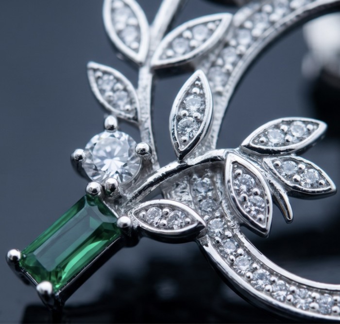 Floral design - 0.8 carat COLOMBIAN Emerald .925 Sterling Silver handmade Earrings - Emerald and diamond floral design close-up on sterling silver jewelry