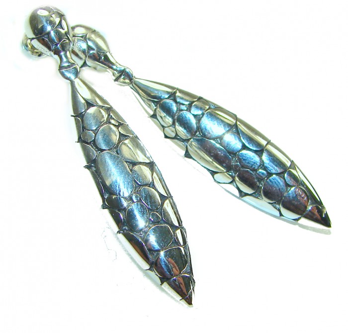 2 inches long - Free Spirit- bohemian Style .925 Sterling Silver handmade Bali made Oversized Earrings - Close-up of textured sterling silver bohemian style dangling earrings.