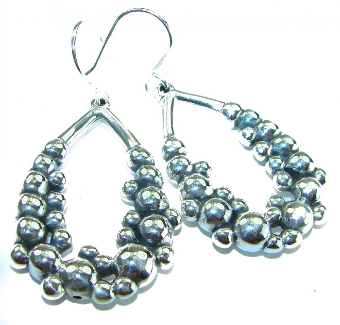 Fancy .925 Sterling Silver Italy made Earrings - Close-up of fancy .925 sterling silver Italy made earrings displaying detail.