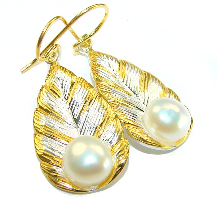 Sublime Blister Pearl 14K Gold over .925 Sterling Silver handcrafted Earrings - Close-up of leaf-shaped earrings with pearls and gold details.