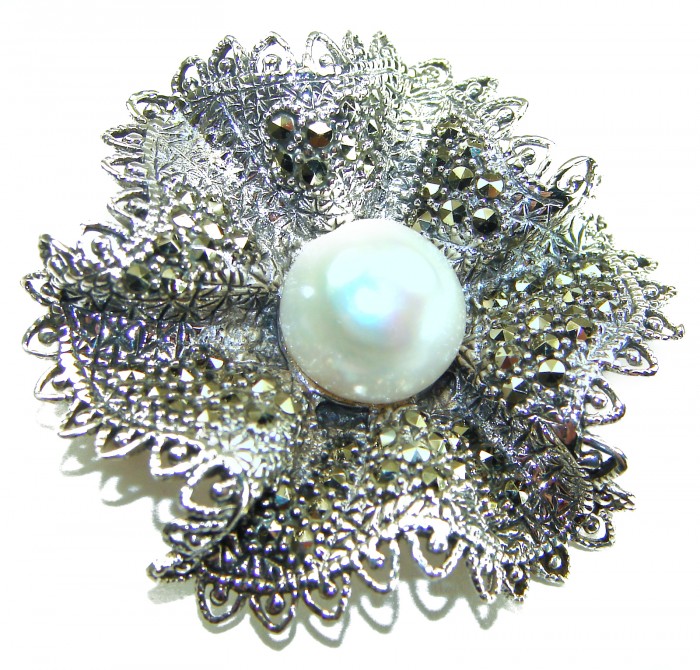 Genuine white Pearl Marcasite .925 Sterling Silver handcrafted Brooch - Close-up of a white pearl and marcasite sterling silver brooch.