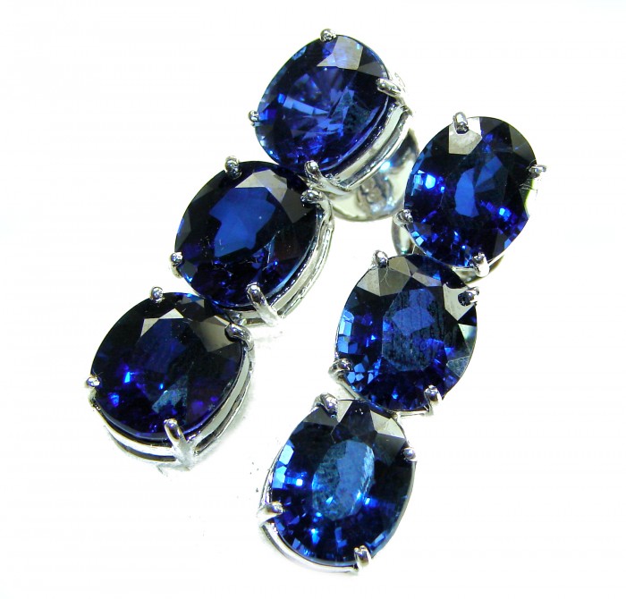 Deep Ocean 22.5 carat London Blue Topaz .925 Sterling Silver handmade Statement earrings - Close-up of London Blue Topaz stones set in sterling silver.