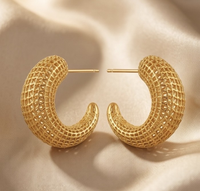 Dubai Style - Golden fancy Drops .925 Sterling Silver dipped in 22K Gold handmade Earrings - Gold textured hoop earrings on silk fabric, side view.