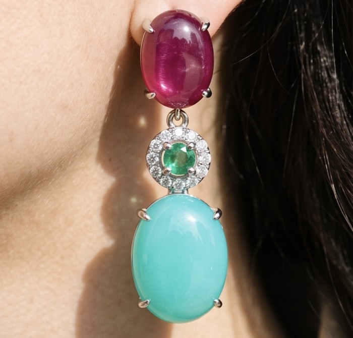 Royalty 10.2 carat COLOMBIAN EMERALD .925 Sterling Silver entirely handmade earrings - Close-up of Royalty 10.2 carat emerald earring worn on ear.
