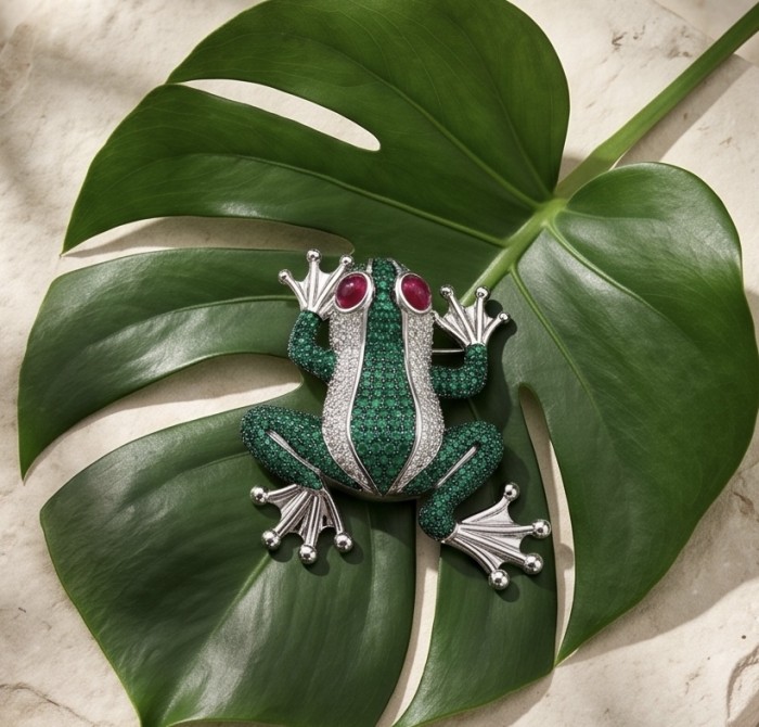 Jumping Frog 5.7 pave Colombian Emerald 1.4 carat Ruby .925 Sterling Silver dipped in rhodium handmade Brooch - Emerald and ruby frog brooch on a leaf, top view.