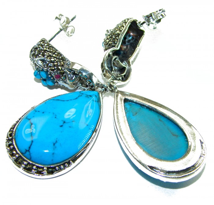 Great authentic Sleeping Beauty Turquoise .925 Sterling Silver handcrafted STATEMENT Earrings - Close-up of Sleeping Beauty Turquoise earrings in sterling silver.