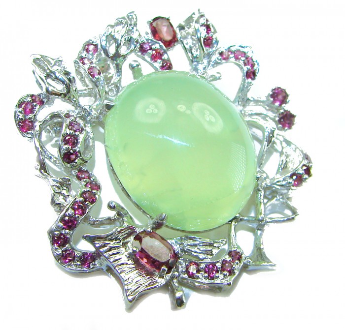 Royal quality genuine 32.5 carat Prehnite from South Africa rhodium over .925 Sterling Silver handcrafted Pendant Brooch - Close-up of ornate brooch with 32.5 carat South African Prehnite.