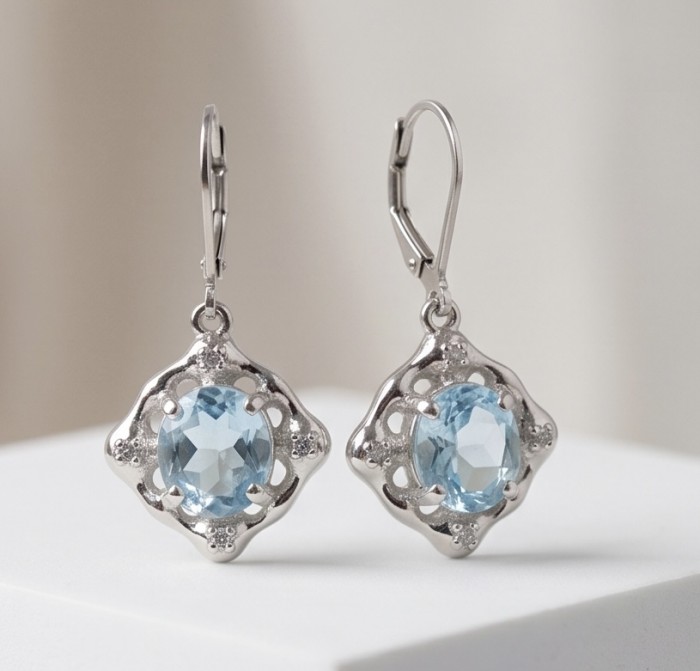 Angelina 8.9 carat authentic Swiss Blue Topaz .925 Sterling Silver Handcrafted Earrings - Elegant Swiss Blue Topaz earrings front view on white background