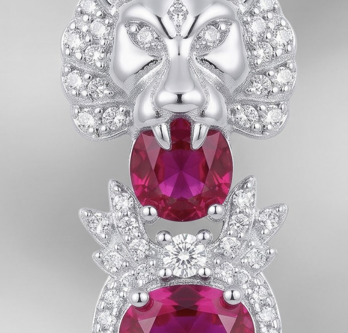 Leo - the King - Genuine 6.8 carat Ruby rhodium over .925 Sterling Silver handcrafted Statement Earrings - Close-up of lion-themed ruby and diamond pendant in rhodium over silver.