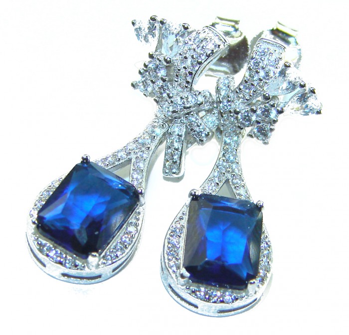 Pear cut 4.5 carat Sapphire .925 Sterling Silver handcrafted incredible earrings - Close-up of sapphire earrings in sterling silver, showcasing details and stones.