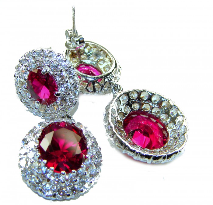 Luxurious natural 10.5 carat Red Topaz .925 Sterling Silver Perfectly handcrafted Earrings - Close-up of luxurious red topaz earrings set in sterling silver.