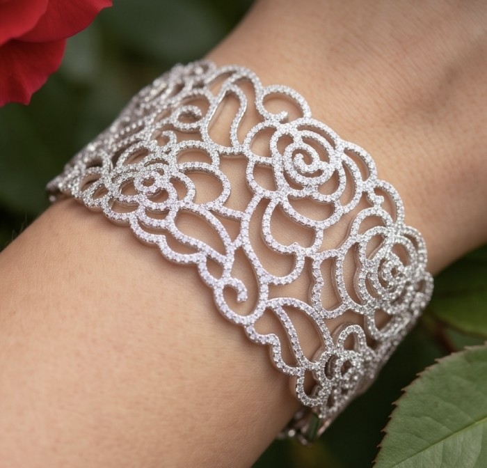 Dolce Vita - Precious Natural 12.5 carat pave White Topaz rhodium over .925 Sterling Silver handcrafted bracelet - Worn on wrist, detailed lace pattern of Dolce Vita 12.5 ct White Topaz bracelet