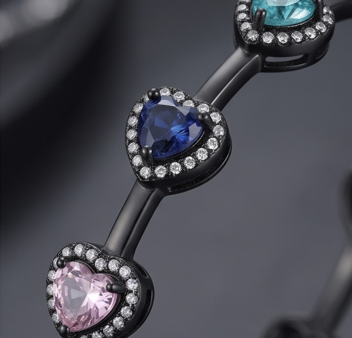 Extravaganza authentic inside-out 10.5 carat Multicolor Sapphire black rhodium over .925 Sterling Silver Handcrafted Hoop Earrings - Heart-shaped sapphire bracelet stone close-up
