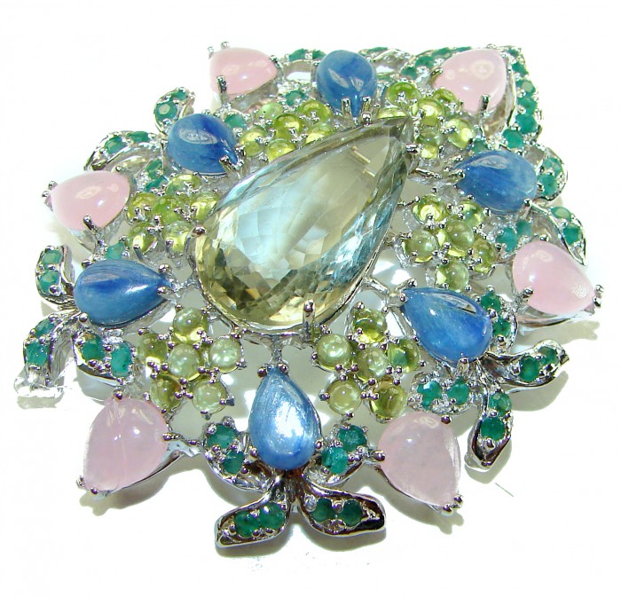 Royalty - Vintage style genuine 85.6 carat Green Amethyst .925 Sterling Silver handmade LARGE Pendant - Brooch - Close-up of vintage style green amethyst jewelry with colorful stones.
