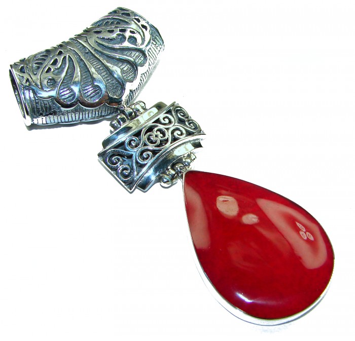 Bright Energy Authentic Coral .925 Sterling Silver Bali handmade pendant - Coral pendant with intricate silver details, close-up view.