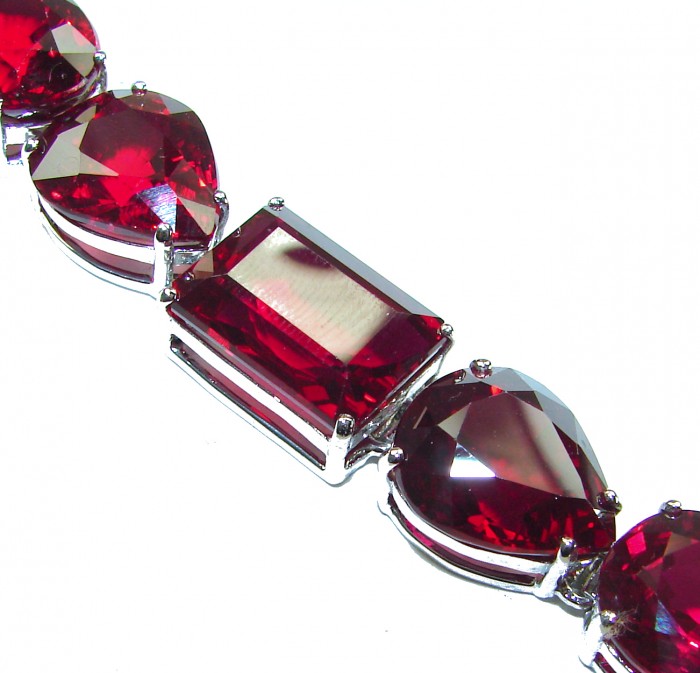 Bella Rosa - Magnificent 145.3 carat authentic Ruby .925 Sterling Silver handcrafted Bracelet - Ruby bracelet close-up showing rectangular and pear-cut stones.