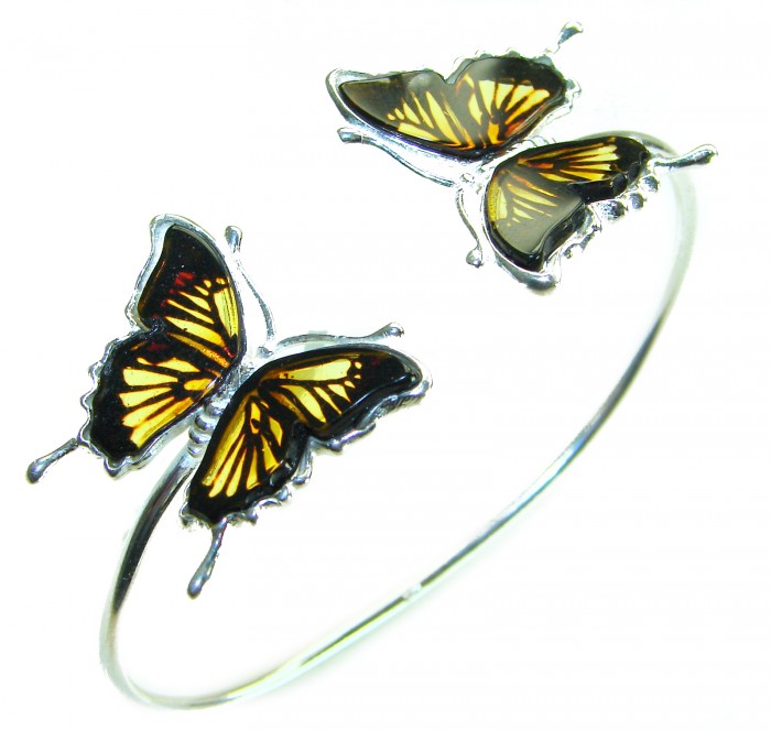 Golden Butterfly Genuine carved Baltic Amber .925 Sterling Silver handamde Bracelet - Bracelet with amber butterflies, close-up detail of butterfly design