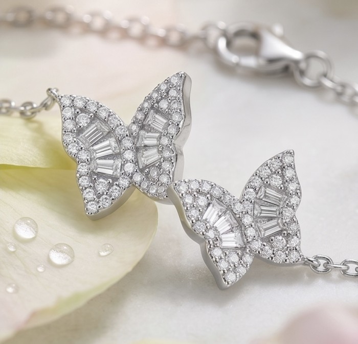 Two white Butterflies natural 7.5 carat White Topaz .925 Sterling Silver handmade Statement Bracelet - Butterfly bracelet close-up, white topaz stones, silver chain detailing