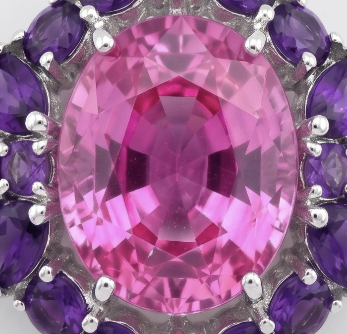 Tiffany Incredible oval cut 20.4 carat Pink Sapphire Amethyst .925 Sterling Silver handcrafted pendant - Close-up of oval cut pink sapphire with purple gem accents.