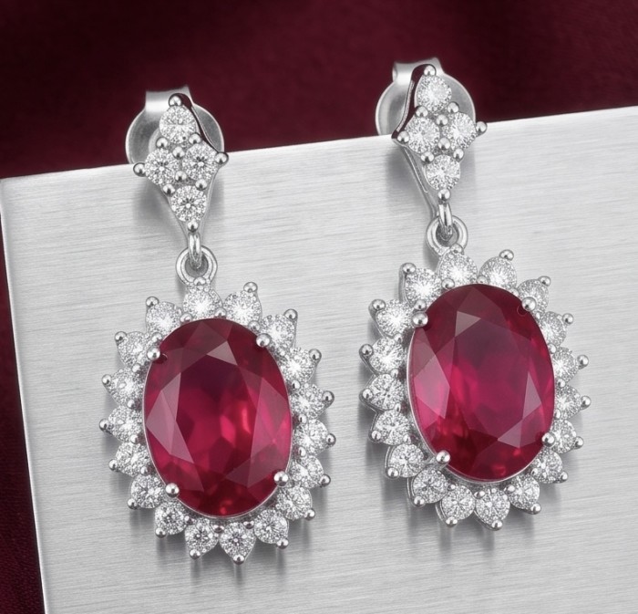 Natural 10.2 carat Mozambique Ruby .925 Sterling Silver dipped in Rhodium Handcrafted Earrings - Close-up of ruby and diamond sterling silver earrings.