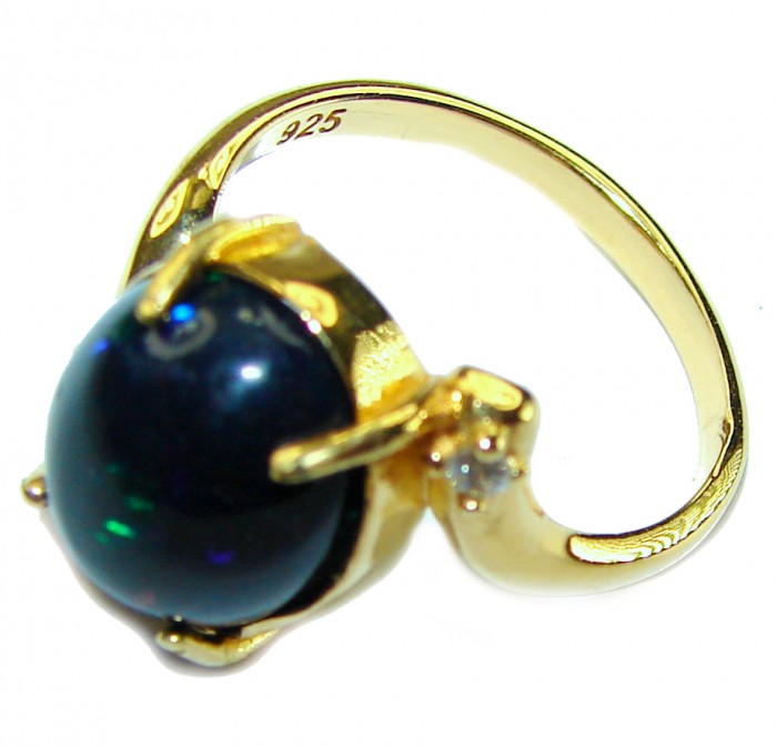 A COSMIC POWER Genuine 8.2 carat Black Opal 18K Gold over .925 Sterling Silver handmade Ring size 5 1/2 - Close-up of black opal ring with 18K gold setting, showing "925" mark.