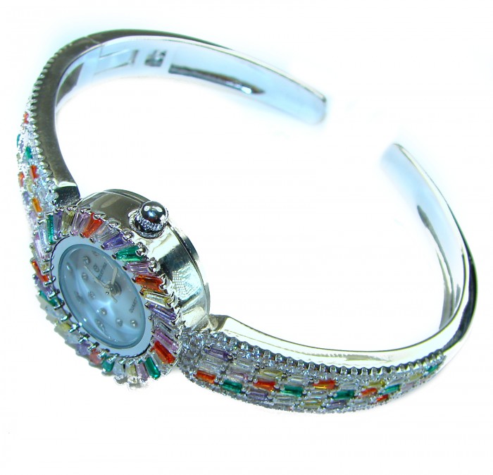 Precious Authentic 33.2 carat multicolor Sapphire .925 Sterling Silver handmade Bracelet Watch - Side view of multicolor sapphire bracelet watch with silver band.