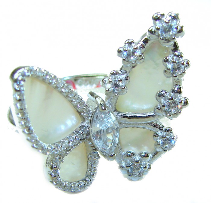 White Butterfly Blister Pearl .925 Sterling Silver brilliantly handcrafted ring s. 6 1/4 - Butterfly ring close-up with white pearls and clear stones in silver setting.