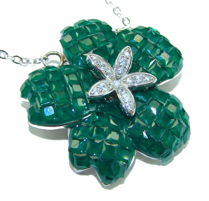 12.2 carat Graceful Authentic mystery setting Colombian Emerald .925 Sterling Silver handcrafted Statement necklace - Close-up of green gemstone pendant with diamond flower accent