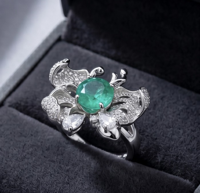 Precious wild Flower 3.2 CARAT Emerald .925 Sterling Silver Statement Ring s. 6 3/4 - Emerald flower ring close-up in a jewelry box, front angle view.