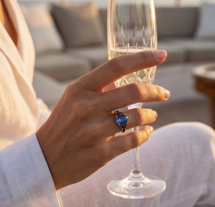 Luxurious 4.5 ctw Tanzanite .925 Sterling Silver handcrafted Statement Ring size 8 - Tanzanite ring worn on hand holding a champagne flute