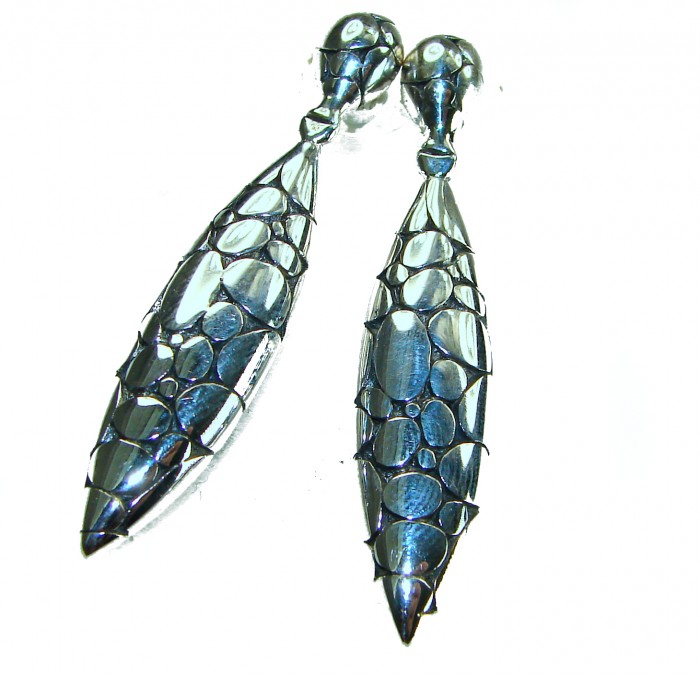 2 inches long - Free Spirit- bohemian Style .925 Sterling Silver handmade Bali made Oversized Earrings - Bohemian style sterling silver earrings, top view showcasing texture.