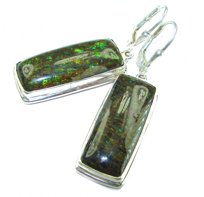 Green Aura Canadian Fire Ammolite .925 Sterling Silver handcrafted earrings - Green Ammolite earrings close-up with silver setting and clasps.