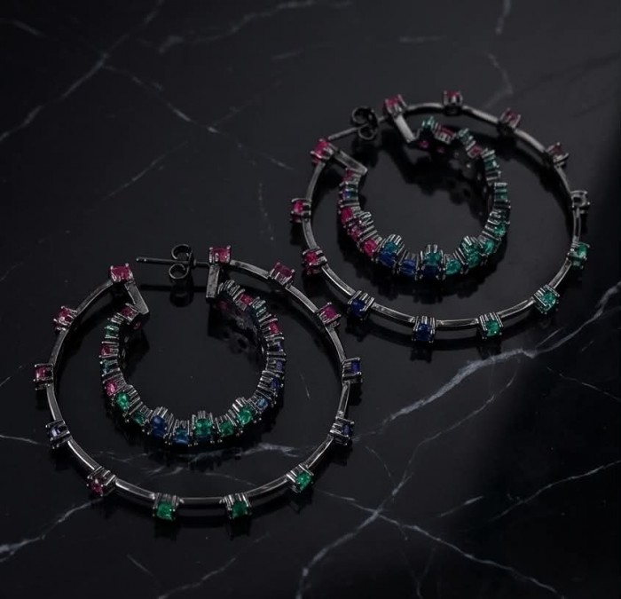 Extravaganza authentic 18.5 carat Pink Tourmaline black rhodium over .925 Sterling Silver Handcrafted Large Hoop Earrings - Two hoop earrings on marble surface with colorful gemstone detail