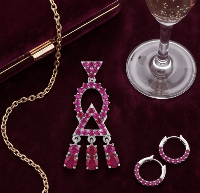 14.2 carat authentic Mozambique Ruby rhodium over .925 Sterling Silver handmade Pendant - Top view of 14.2 carat Mozambique Ruby jewelry set on velvet background