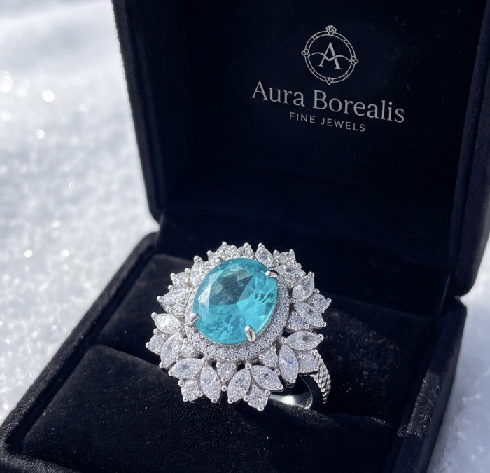 Elizabeth 6.4 carat Paraiba Tourmaline 7.2 carat Moissanite .925 Sterling Silver Handcrafted Ring size 6 - Paraiba Tourmaline ring in box, top view close-up.