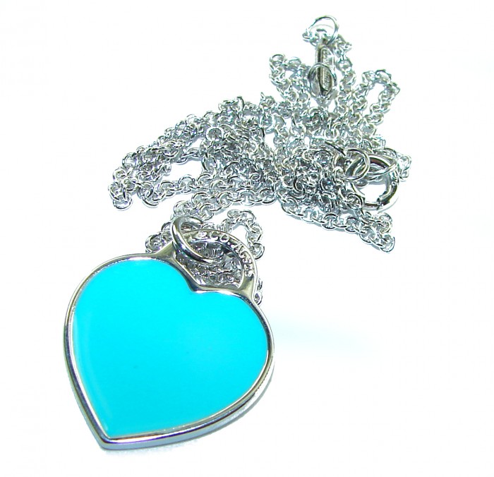 Angel's Heart inlay Turquoise .925 Sterling Silver handcrafted necklace - Turquoise heart pendant with chain, front view, silver detail visible.